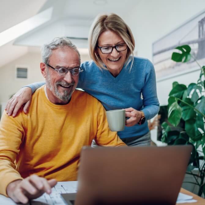 Image showing an older couple on their laptop