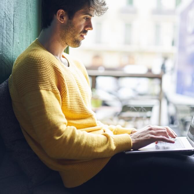 Image showing a man on his laptop