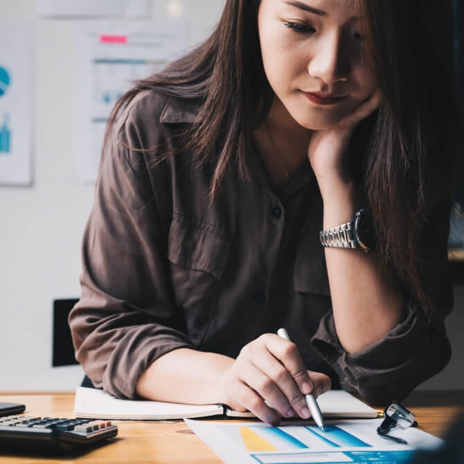 Image showing a woman looking at paperwork