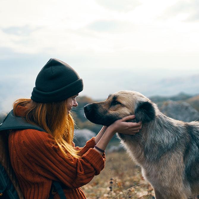 Image showing a woman outside with her dog